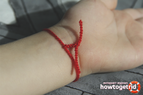 Comment porter un fil rouge sur votre poignet